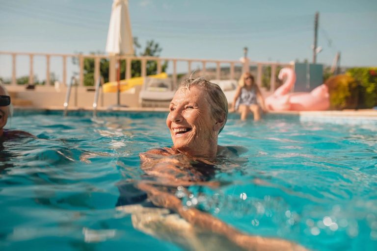 Elder lady smiling pool