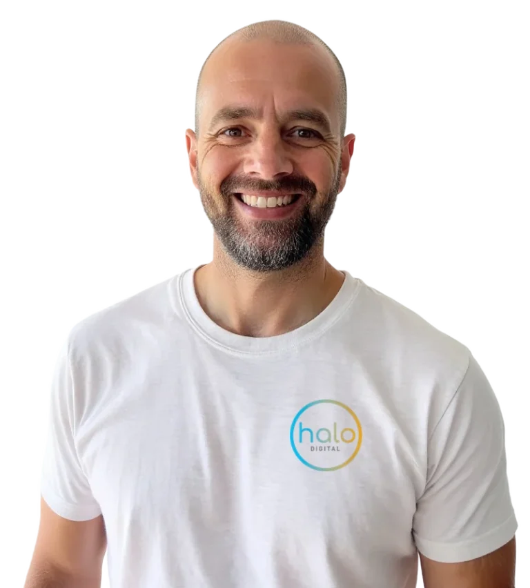 James Alviani, founder of Halo Digital, smiling in a Halo Digital t-shirt
